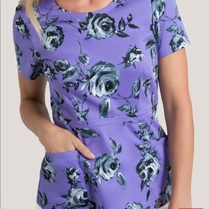 Jaanuu peplum top in ultra violet rose. 💜 Size M